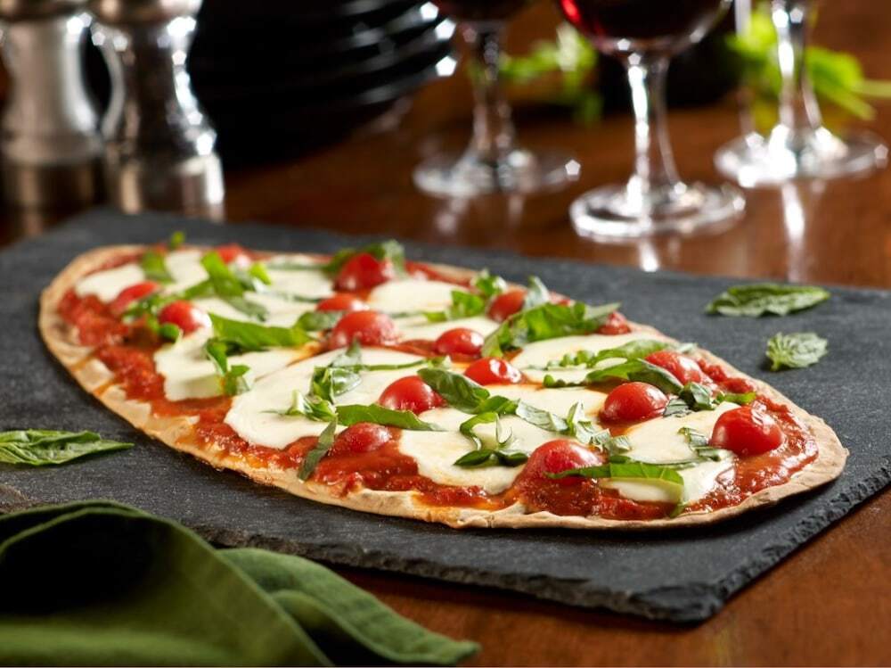 Margherita flatbread on granite