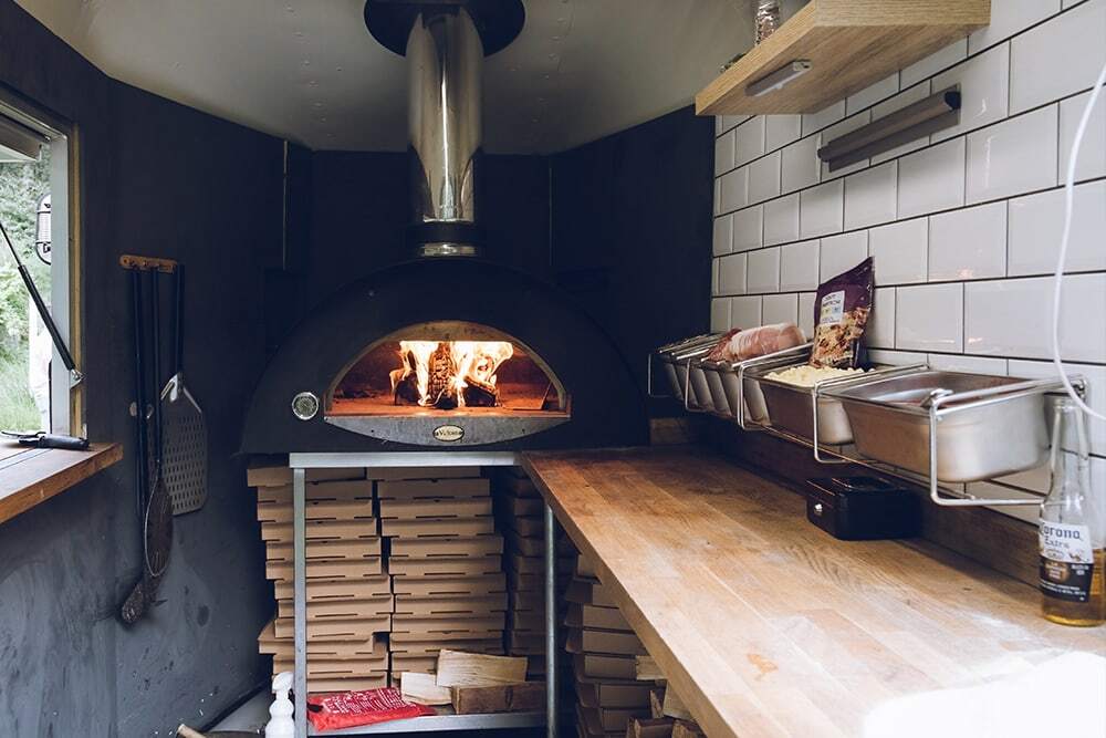 the inside of a pizza food truck