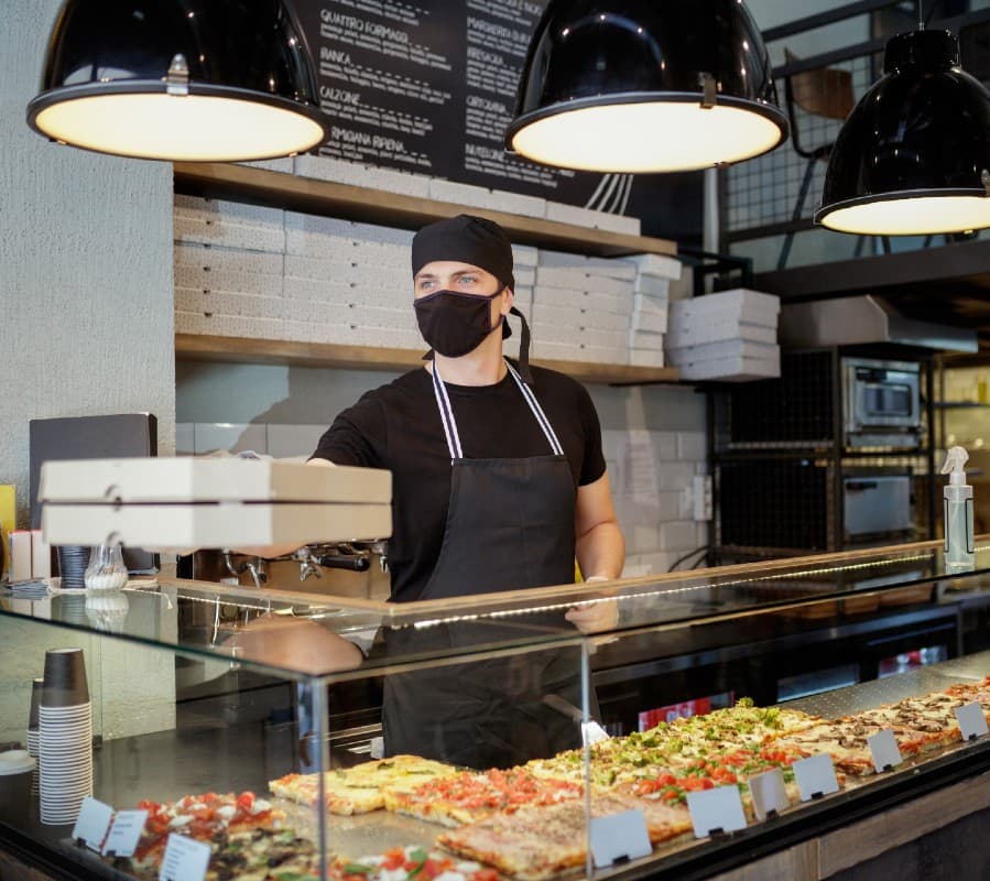 man-handing-pizza-boxes